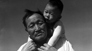 A Japanese American grandfather and grandson at Rohwer Camp